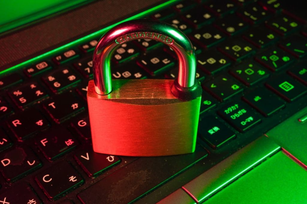 Padlock on keyboard representing website launch checklist security and protection steps.